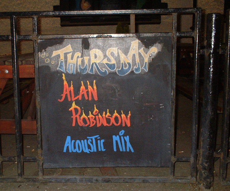 how exciting, a picture of a chalk board with the name Alan Robinson on it